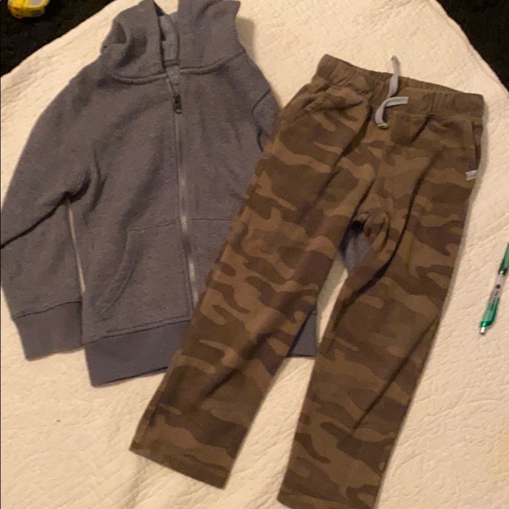 Gray zip up hoodie and camo pants